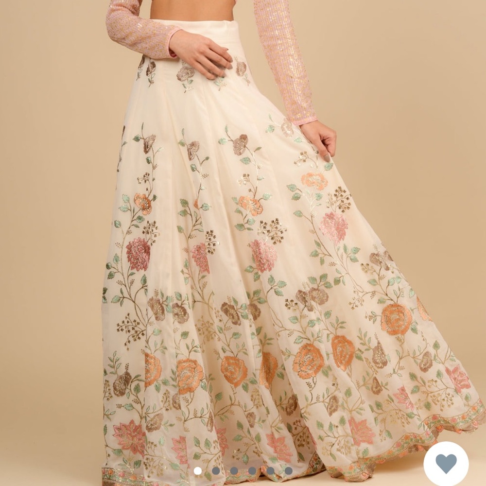 Saree Room seafoam green tassel blouse & beige Isha skirt.